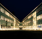 Exterior view of Taj Pharmaceuticals Diagnostics Graz, Austria, at night 